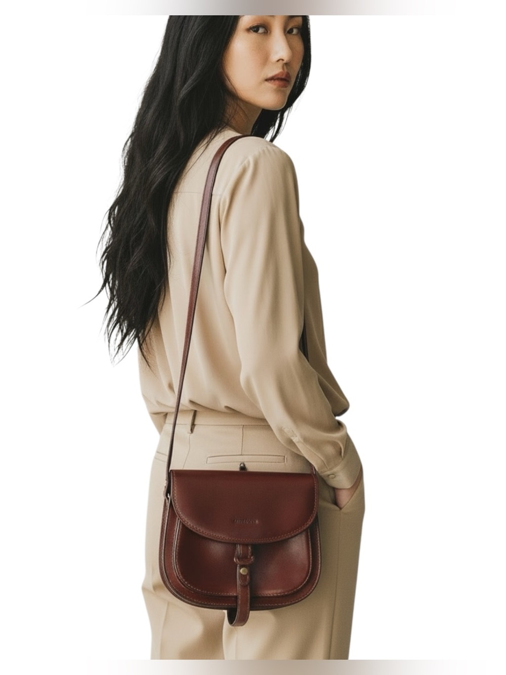 Gianni Conti rich brown polished leather saddle crossbody bag flap over front